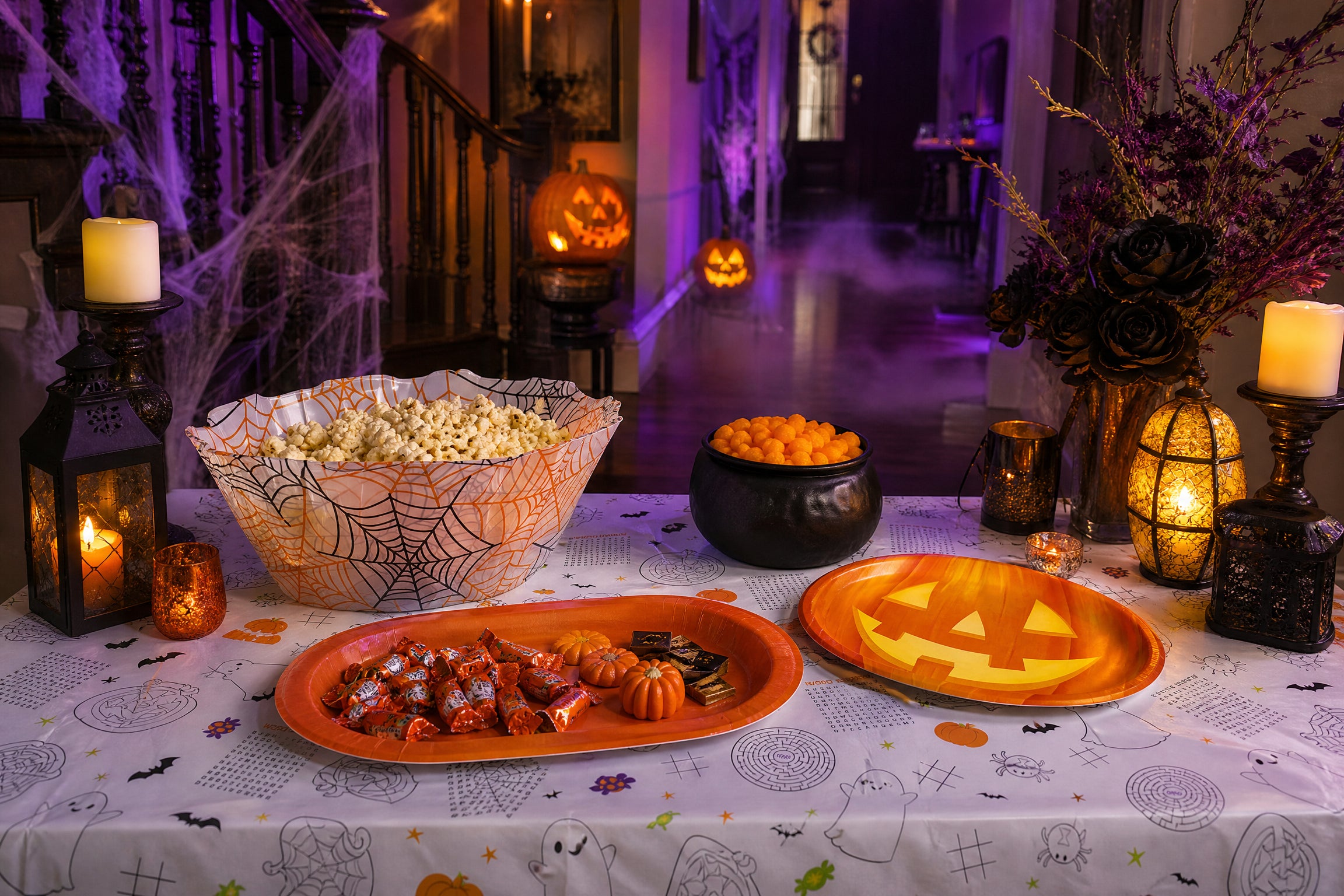 Spooky haunted house party setup with Halloween decorations and tableware